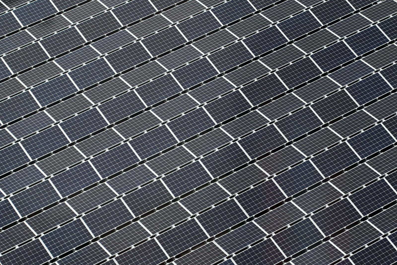 What are the consequences of changing feed-in tariffs in photovoltaics?